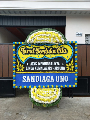Papan Bunga Duka di Tapak Lebar